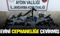 Evini cephaneliğe çevirmiş