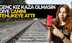 Genç kız kırılan bariyeri trenin önünden çekip bir faciayı önledi! O anlar kameraya yansıdı