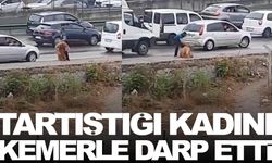 Tartıştığı kadını kemerle darp etti