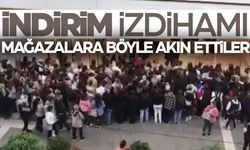 İzmir’de güvenlik kontrolünden geçenler mağazalara böyle akın etti