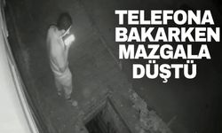 Telefona bakarken mazgala düştü