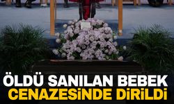 Öldü sanılan bebek cenazesinde dirildi