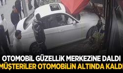 Otomobil güzellik merkezine daldı… Müşteriler otomobilin altında kaldı