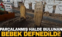 Boş arazide parçalanmış halde bulunan bebek defnedildi