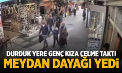 Kemeraltı'nda yürüyen genç kıza tekme attı! Meydan dayağı yedi