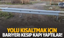 Yolu kısaltmak için bariyeri kesip kapı yaptılar!