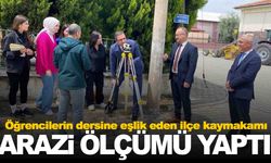 Kaymakam öğrencilerle birlikte arazide ölçümü yaptı
