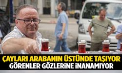 Çayları arabanın tepesine koyup taşıyor! Görenler inanamıyor