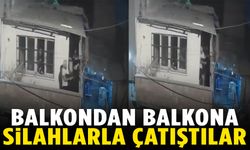 Balkondan balkona silahla çatıştılar!