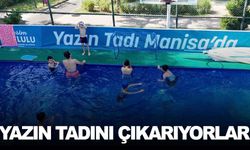 Şehzadeler’de çocuklar portatif havuzda serinliyor