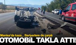 Manisa’da bariyerlere çarpan otomobil takla attı!