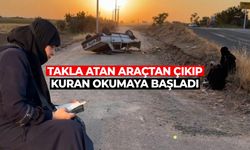 Takla atan araçtan çıkıp Kuran-ı Kerim okumaya başladı
