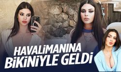 Derin Talu havalimanına bikiniyle geldi