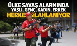 Herkes silahlanıyor! Kadın, yaşlı, genç fark etmiyor... Ülke savaşa hazırlanıyor!