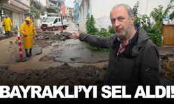 Bayraklı’da şiddetli yağış hayatı felç etti: Rögarlar taştı, yollar göle döndü