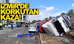İzmir’de faciadan dönüldü… Kontrolden çıkan tır yan yola devrildi!