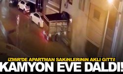 Freni boşalan kamyon duvarı yıkarak eve girdi