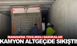 Manisa’da kamyon altgeçide sıkıştı! Tehlikeli dakikalar!
