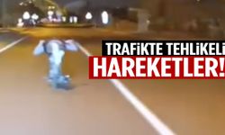 Trafikte tehlikeli hareketler! Motosikleti yatarak kullandı