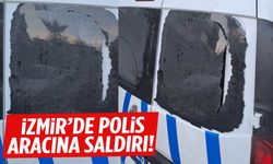 İzmir’de polis aracına saldırdılar!