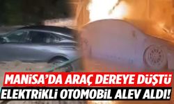 Manisa’da araç dereye düştü… Elektrikli otomobil alev aldı!