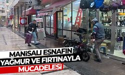 Manisalı esnafın yağmur ve fırtınayla mücadelesi
