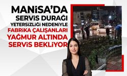 Manisa’da çalışanlar yağmur altında servis bekliyor