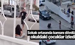 Okuldaki çocuklar izlerken sokak ortasında karısını dövdü
