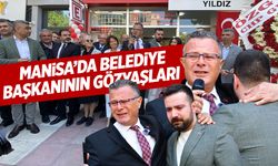 Belediye başkanı ve oğlu gözyaşlarına boğuldu