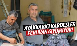 Manisa’da ayakkabıcı kardeşler pehlivan giydiriyor!