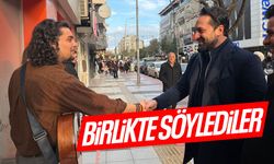 Mücahit Arınç sokak sanatçısına şarkıyla eşlik etti