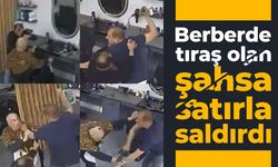 Berberde tıraş olan şahsa satırla saldırdı
