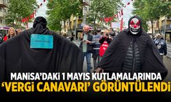Manisa'da 1 Mayıs kutlamalarında 'Vergi Canavarı' görüntülendi