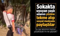 Sokakta uyuyan yaşlı adamın yüzüne tekme attılar