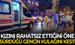 Kızını rahatsız ettiğini öne sürdüğü gencin kulağını kesti