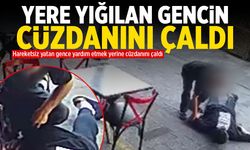 Yere yığılan gence yardım etmek yerine cüzdanını çaldı!