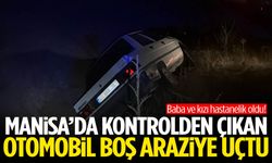 Manisa’da kontrolden çıkan otomobil boş araziye uçtu