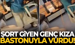 Şort giyen genç kıza bastonla vurdu!