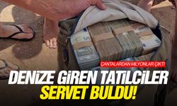 Denize giren tatilciler servet buldu! Çantalardan milyonlar çıktı