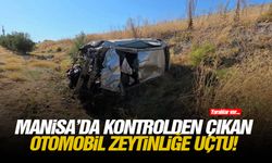 Manisa’da kontrolden çıkan otomobil zeytinliğe uçtu!