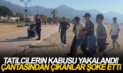 Tatilcilerin kabusu yakalandı! Çantasından çıkanlar şoke etti