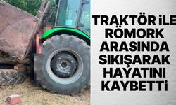 Traktör ile römork arasında sıkışarak hayatını kaybetti