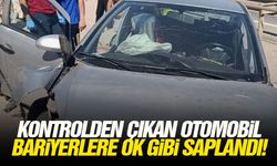 Kontrolden çıkan otomobil bariyerlere ok gibi saplandı!