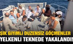 Şık giyimli düzensiz göçmenler yelkenli teknede yakalandı