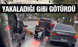 Trafikte köpeğin vatandaşı ayağından ısırıp sürüklediği anlar