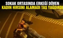 Sokak ortasında erkeği dövdü! Hırsını alamayıp taş yağdırdı
