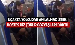 Yolcunun isteğini duyan hostes diz çöküp gözyaşlarına boğuldu