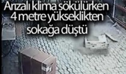 ARIZALI KLİMA SÖKÜLÜRKEN 4 METRE YÜKSEKLİKTEN SOKAĞA DÜŞTÜ