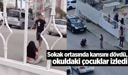 Okuldaki çocuklar izlerken sokak ortasında karısını dövdü