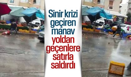 Sinir krizi geçiren manav yoldan geçenlere satır çekti